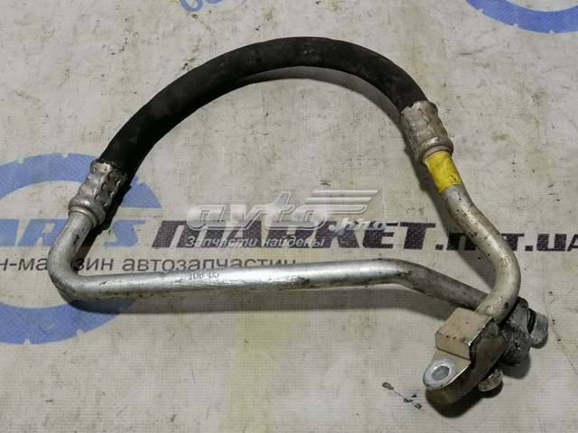 Трубка кондиціонера від компресора до радіатора 92490EB400 NISSAN