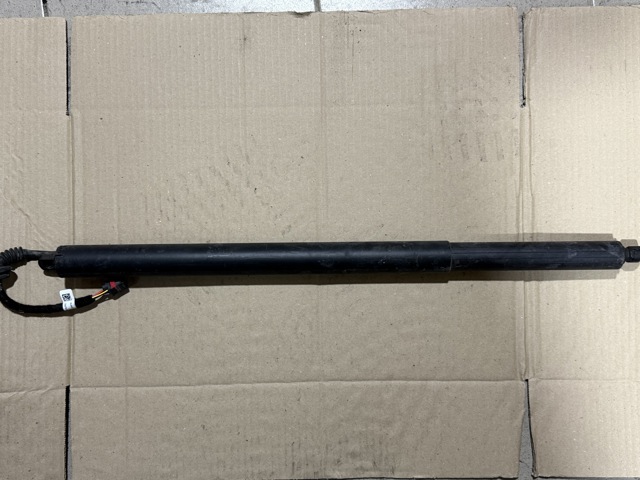 Амортизатор двері 3/5-ї задньої 4KE827851 VAG