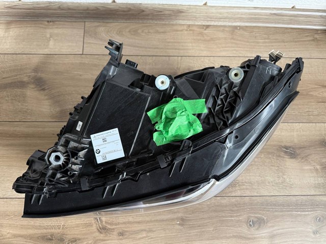 Основна фара в зборі ліва 63115A0E5F5 BMW