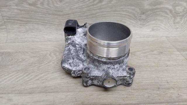 Дросільна заслінка в зборі 06K133062AN VAG