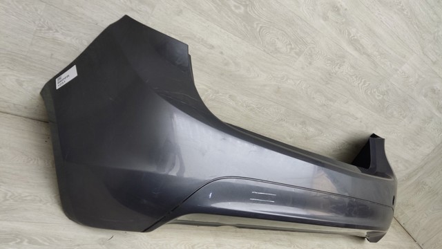 Кожух бампера заднього 13267966 OPEL