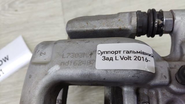 Задній гальмівний супорт лівий 13515113 GM