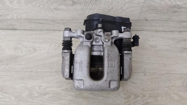 Задній гальмівний супорт лівий 13529258 GM