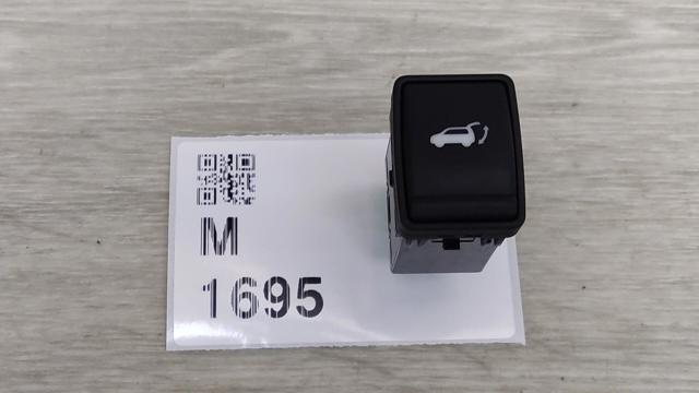 Кнопка салону приводу замка 3/5 дверей (ляди) / кришки багажника 252614CL0A NISSAN