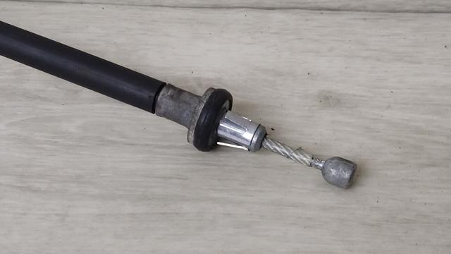Трос ручного гальма задній, лівий 365314CE0A NISSAN