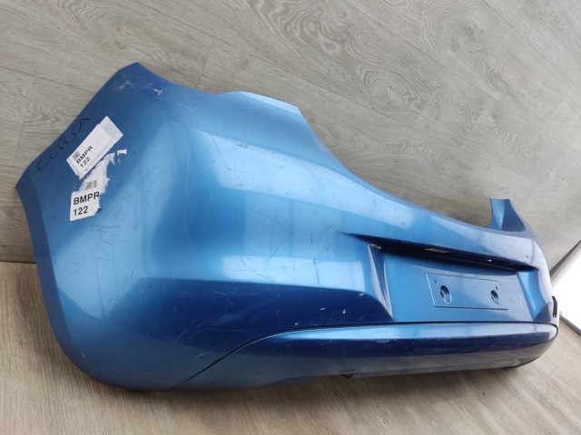 Кожух бампера заднього 39002839 OPEL