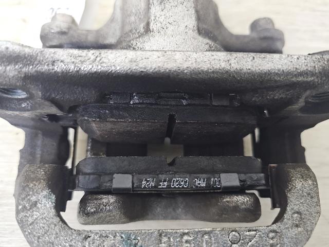 Супорт гальмівний задній правий 440013NK0A NISSAN