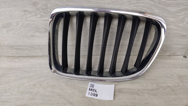 Решітка радіатора ліва 51112993307 MARKET (OEM)