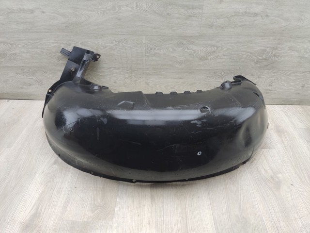 Підкрилок задній лівий 51718403059 BMW