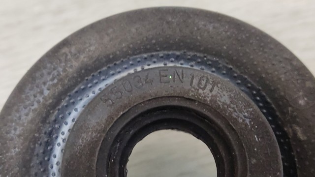 Проставка (гумове кільце) пружини задньої, верхня 55034EN101 NISSAN