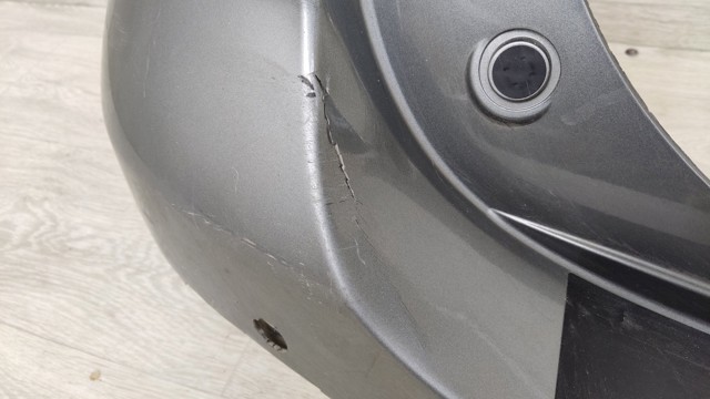 Кожух бампера заднього 7181161M SUZUKI