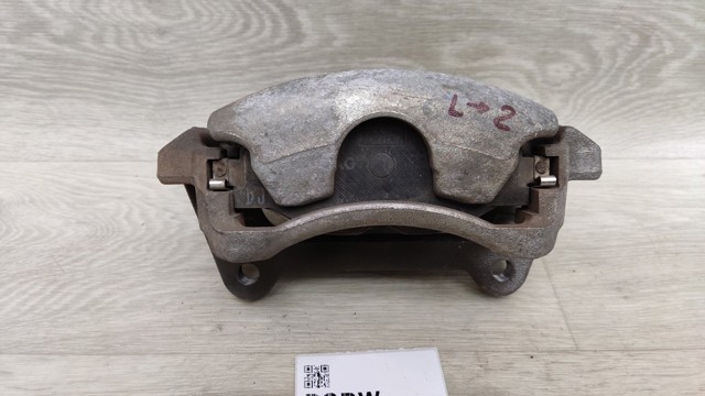 Супорт гальмівний, передній, лівий 8V0615123D VAG