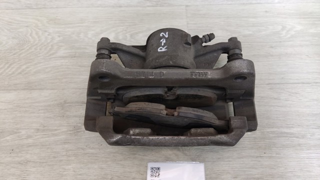 Супорт гальмівний, передній, правий 8V0615124D VAG