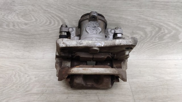 Задній гальмівний супорт лівий D40106RA0C NISSAN