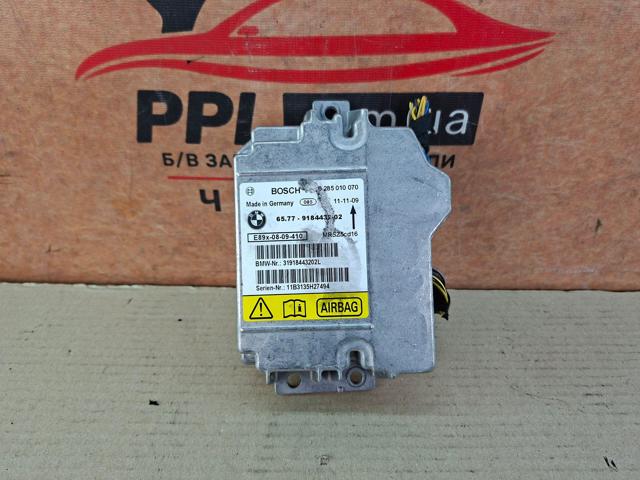 Блок управління airbag 65779184432 BMW