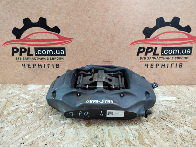 Супорт гальмівний, передній, лівий 7P6615105AF VAG
