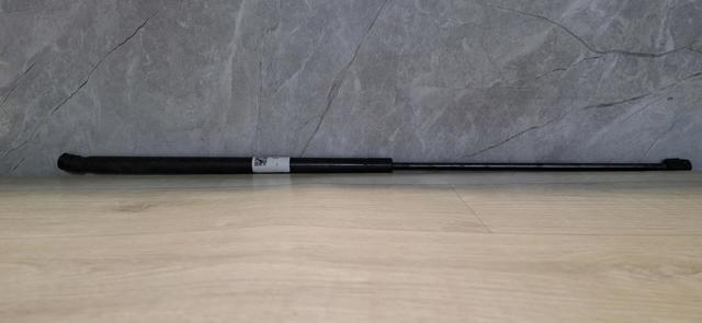 Амортизатор капота лівий KT4BR16C827AB FORD