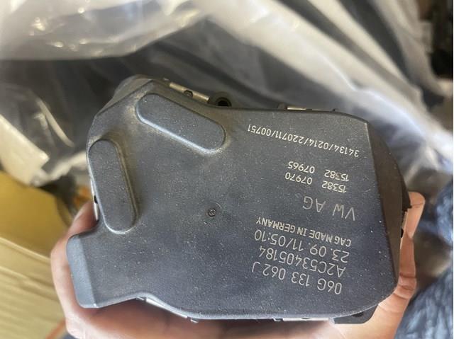 Дросільна заслінка в зборі 06G133062J VAG