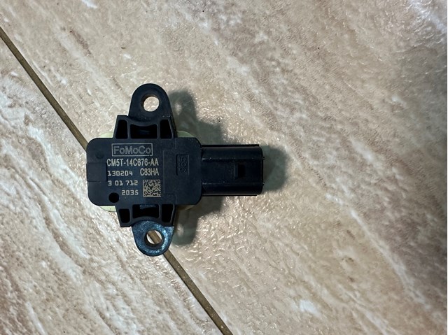 Датчик Ейрбег передній CM5T14C676AA FORD