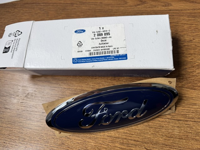 Емблема решітки радіатора 2069895 FORD