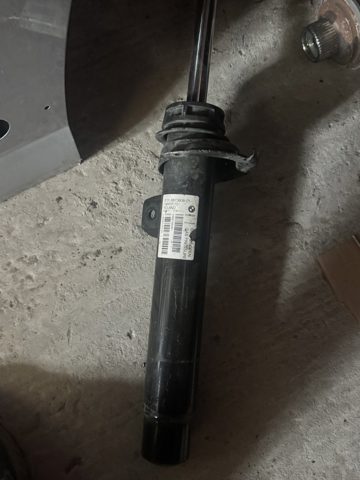 Стойка амортизатора передняя 31316873808 BMW