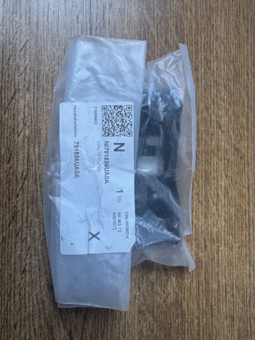 Ліве кріплення заднього бампера 791856UA0A NISSAN