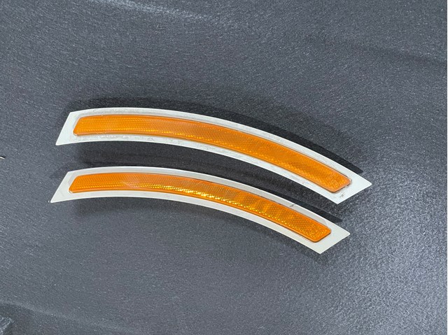 Катафот (відбивач) переднього бампера, правий 7290094 BMW