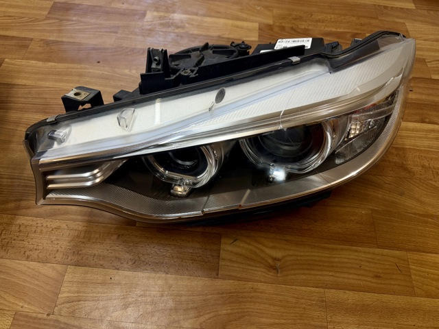 Фара ліва 63117377853 BMW
