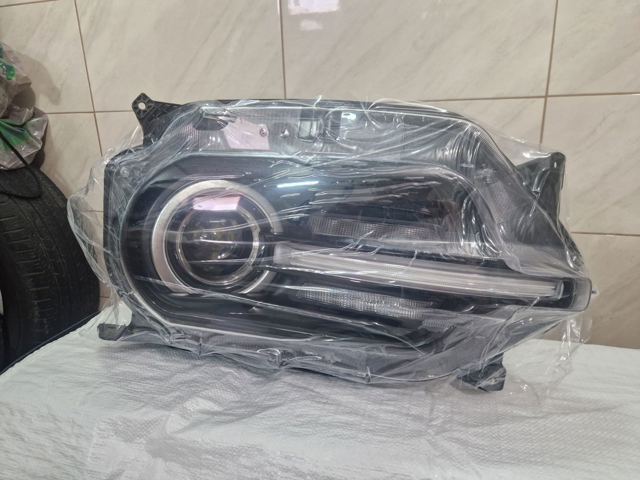 Основна фара в зборі ліва EBY432490L4272 GLOSSYAUTOPARTS