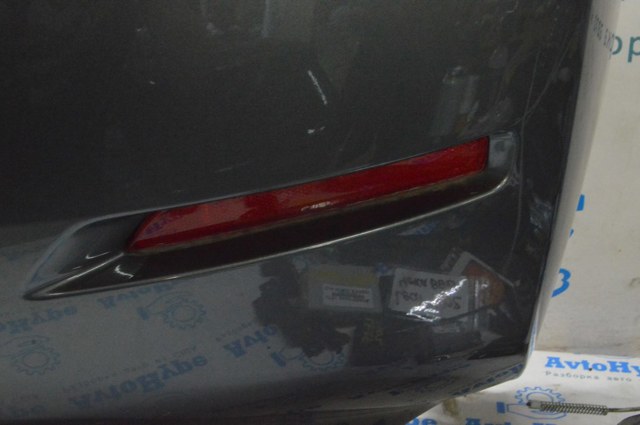 Правий катафот бампера 265608990B NISSAN