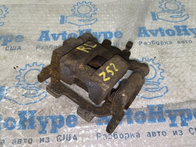 Задній гальмівний супорт лівий 440111AA0A NISSAN