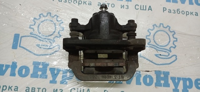 Задній гальмівний супорт лівий 440113NF0A NISSAN