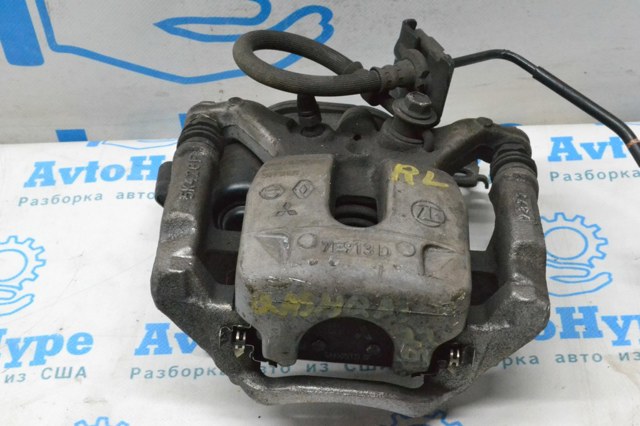 Задній гальмівний супорт лівий 440116RA0B NISSAN