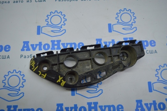 Лівий кронштейн переднього бампера 5253648020 TOYOTA