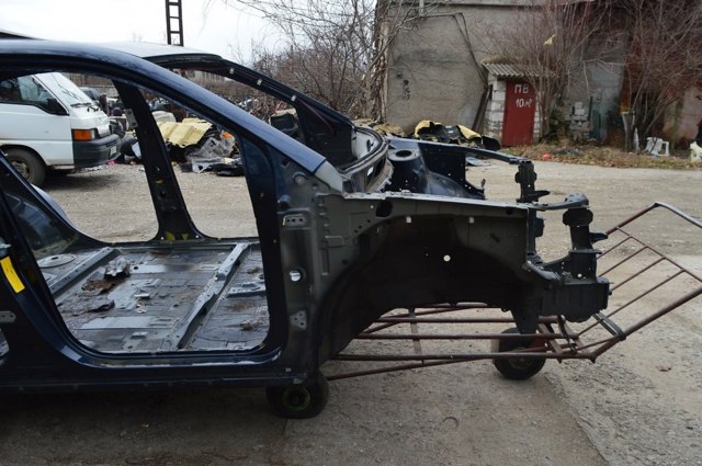 Панель бризковика (лонжерону) моторного відсіку, ліва 537020E010 TOYOTA
