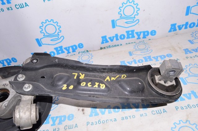 Важіль/тяга задньої підвіски подовжній нижній, лівий 555025DJ0A NISSAN