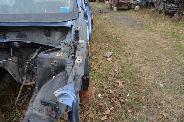 Кронштейн кріплення крила переднього лівого, передній 57160SG0109P SUBARU