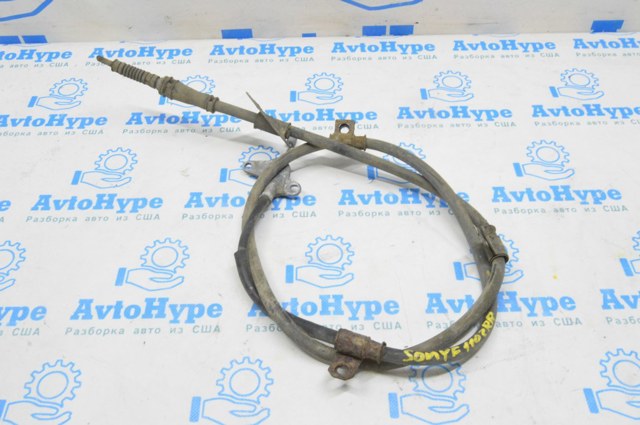 Трос ручника задній правий 597703Q300 HYUNDAI