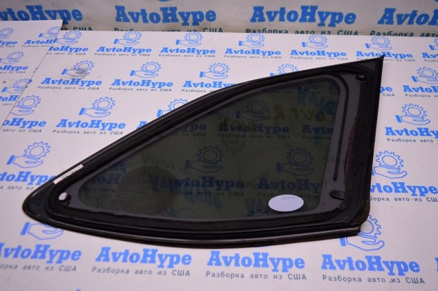 Скло багажника, ліве 65209AL11A SUBARU