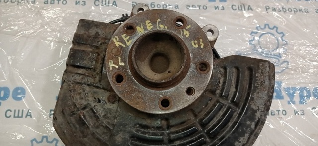Цапфа - поворотний кулак задній, лівий 68246624AA CHRYSLER