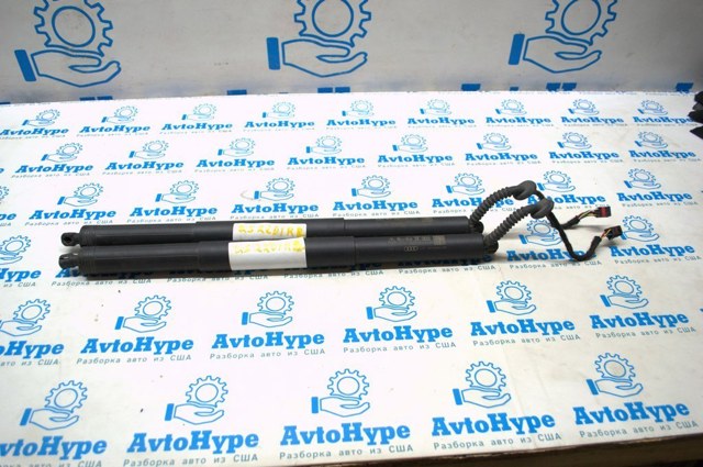 Амортизатор двері 3/5-ї задньої 80A827851C VAG