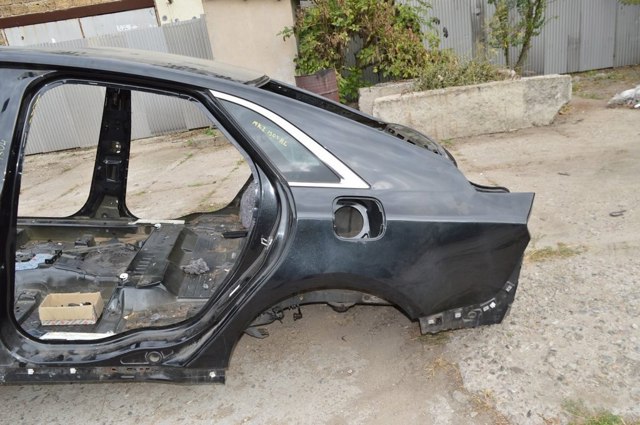 Крило заднє ліве DP5Z5427841A FORD