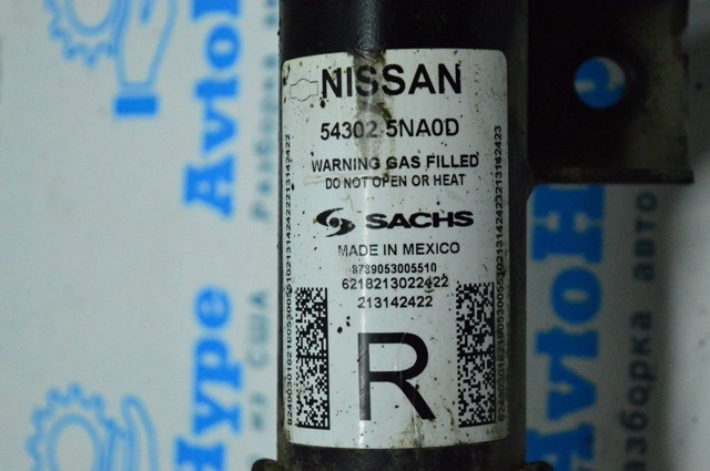 Амортизатор передньої підвіски E43025NA0D NISSAN