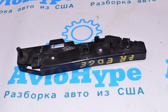 Кронштейн кріплення бампера переднього правий FT4Z17C947A FORD