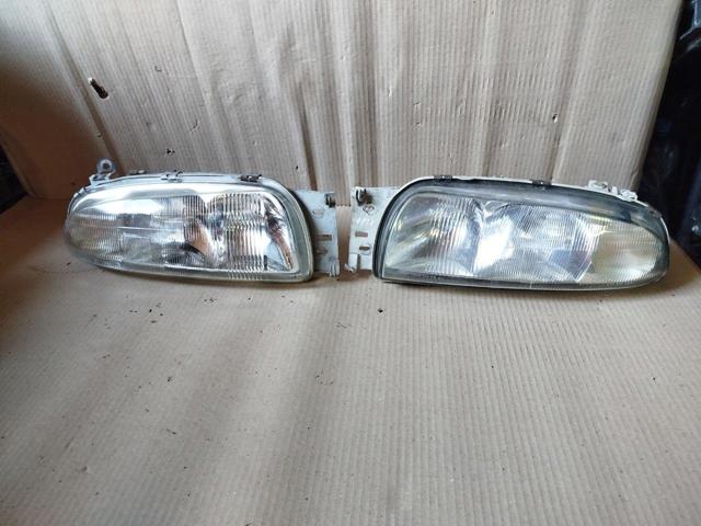 Фара основна ліва 301049201 FORD