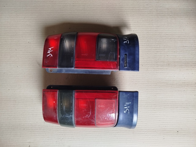Ліхтар задній лівий Volkswagen Caddy 2