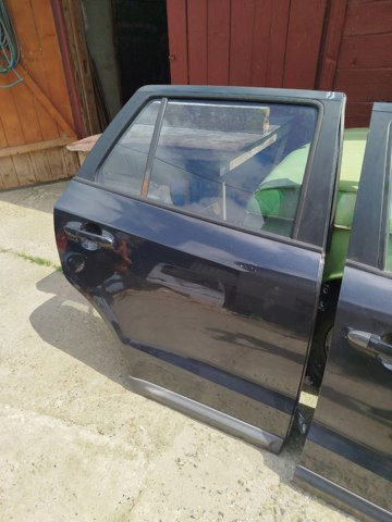 Двері пасажирські задні праві 770042B030 HYUNDAI