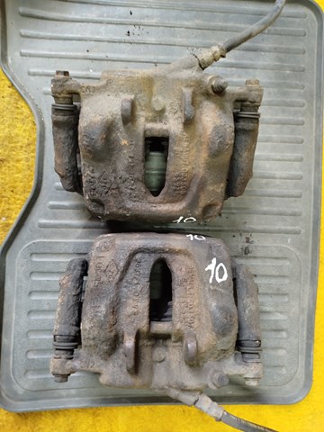 Супорт гальмівний, передній, правий 7701051808 RENAULT