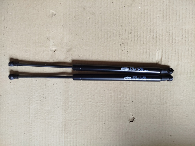 Амортизатор двері 3/5-ї задньої GS0487 MAGNETI MARELLI
