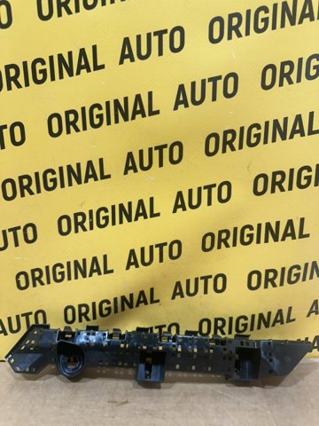 Кронштейн бампера переднього 57707SJ130 SUBARU